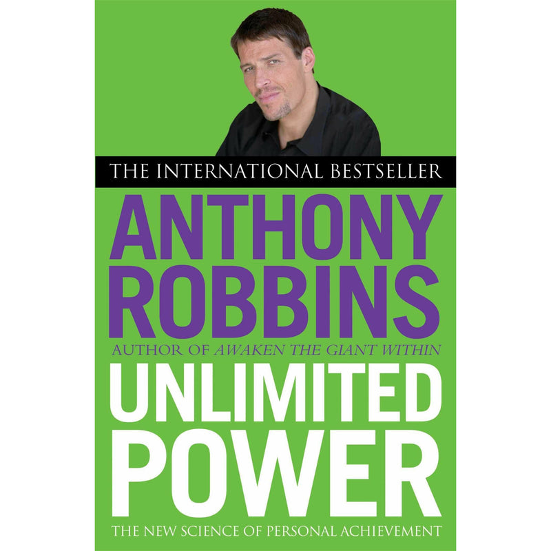 Ant crawling on the cover of "Unlimited Power" by Tony Robbins, a personal achievement and self-help book published by Simon & Schuster UK.