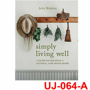 Hardcover of Simply Living Well by Julia Watkins, featuring a natural-themed cover with eco-friendly and low-waste living elements.